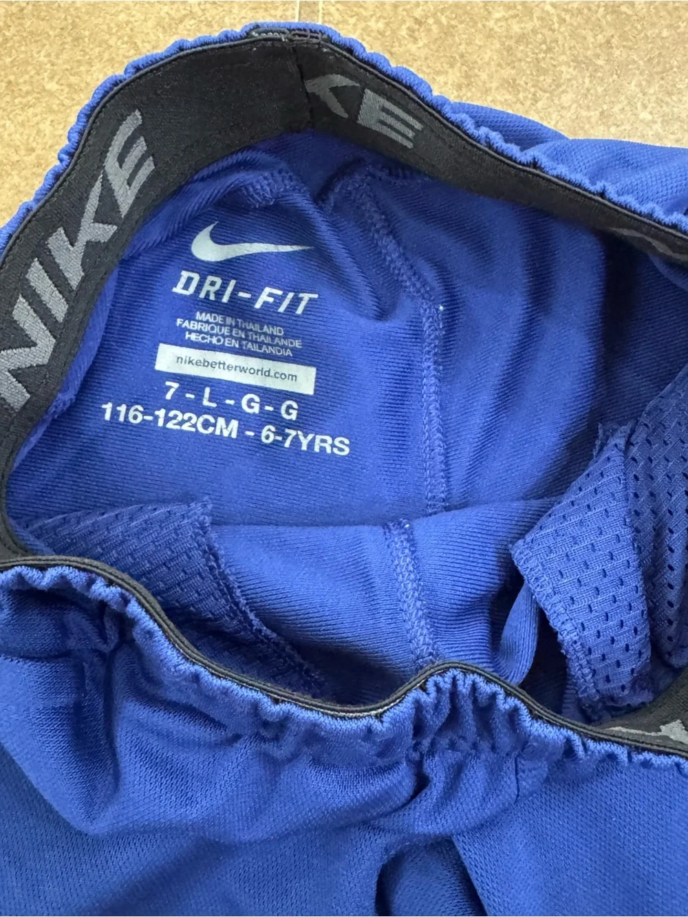 Nike Blue Athletic Shorts with Red Accent